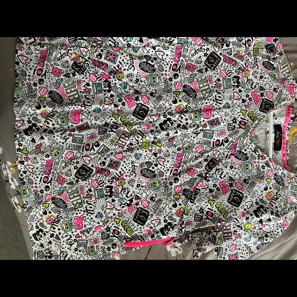 Neon and white scrub top and white scrub pants